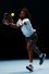©Yong Teck Lim/Getty Images Cầu thủ tennis Evan King thực hiện một cú ve.